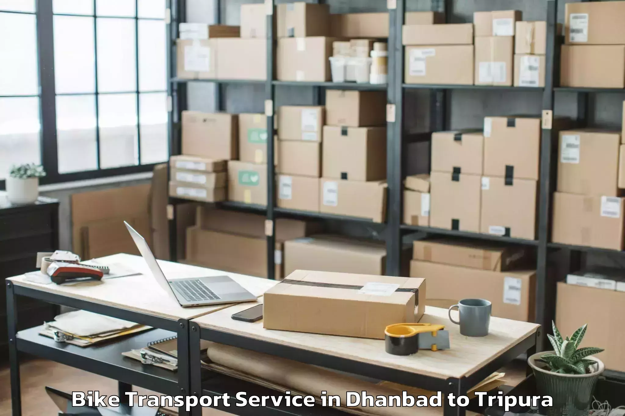 Book Dhanbad to Jampuijala Bike Transport Online